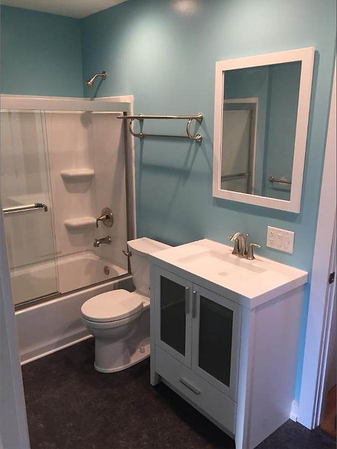 Finished bathroom — new tub, surround, vanity and fixtures